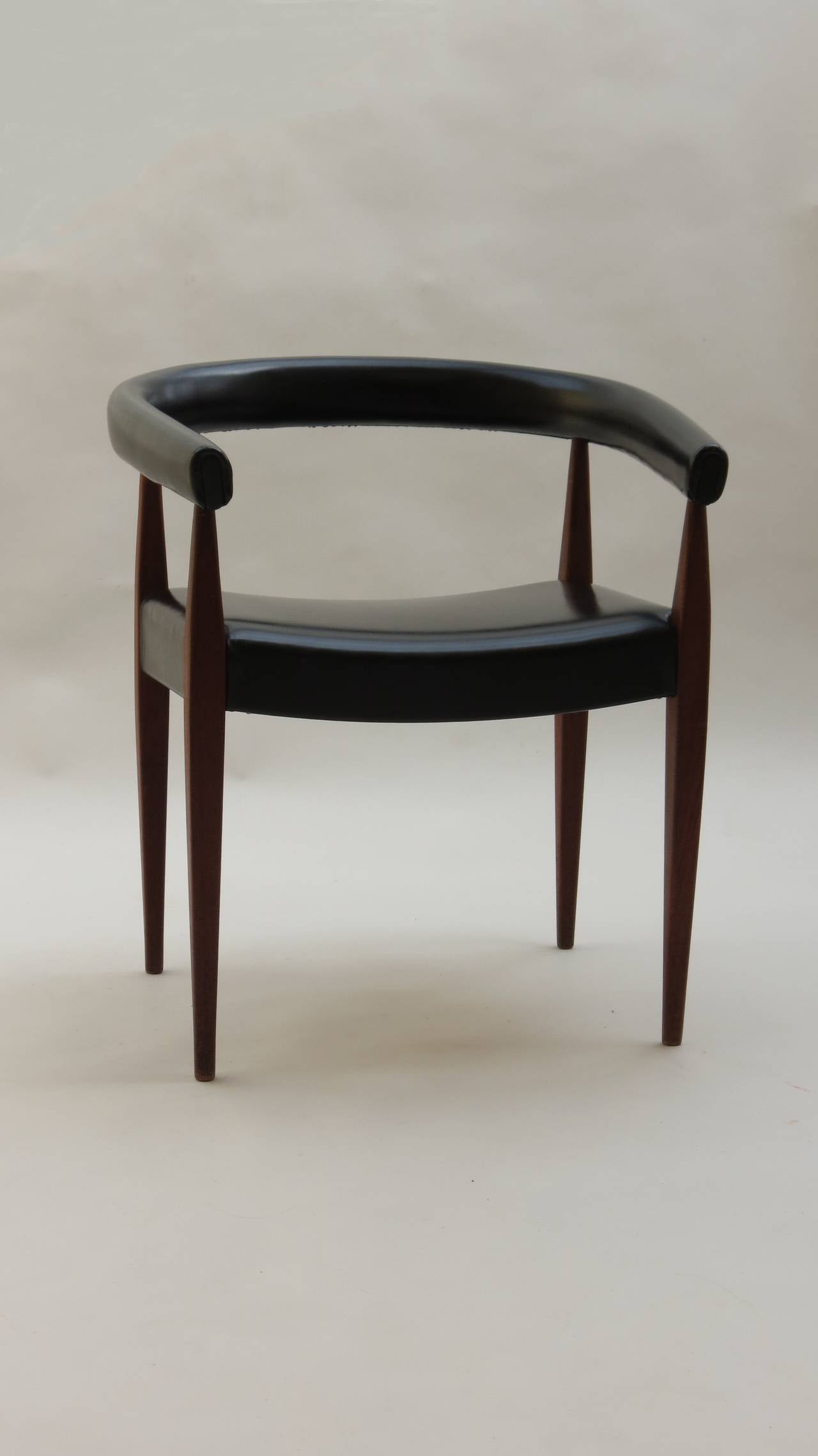 Offerd by Zitzo, Amsterdam: Rare Armchair by Nanna Ditzel, #114 for Kolds Savvaerk, Denmark. Solid teak legs and original black leatherette.

Shipping services: Ask for our competitive shipping quotes.