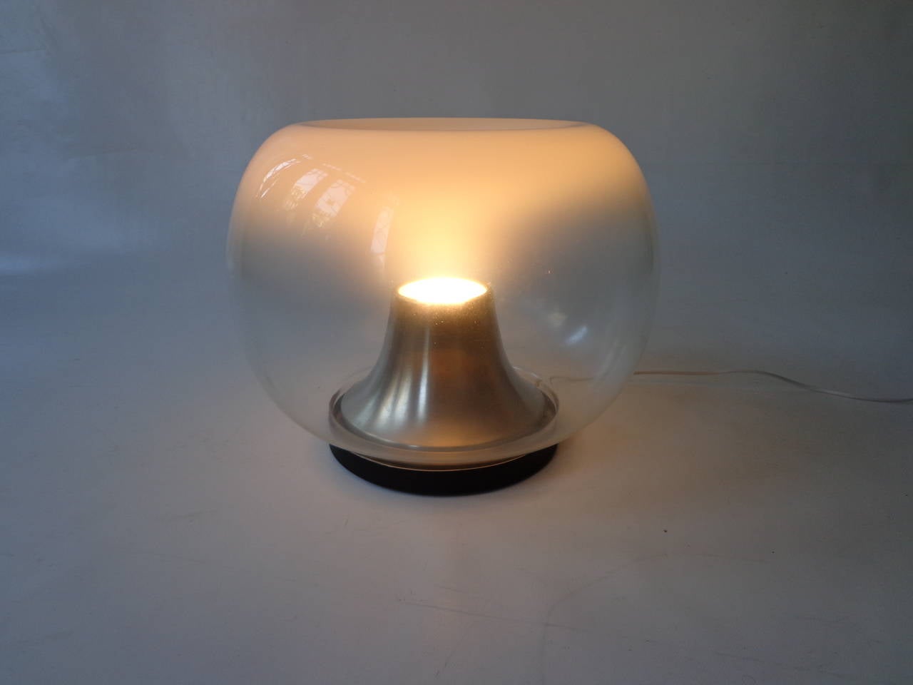 The glass globe has a white glow in the top which gives a beautiful warm light.

Shipping services:
Ask for our competitive shipping quotes.