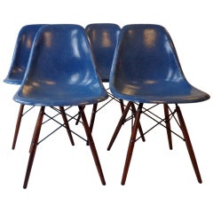 Four Dining Sideshells Wood from Charles Eames for Herman Miller