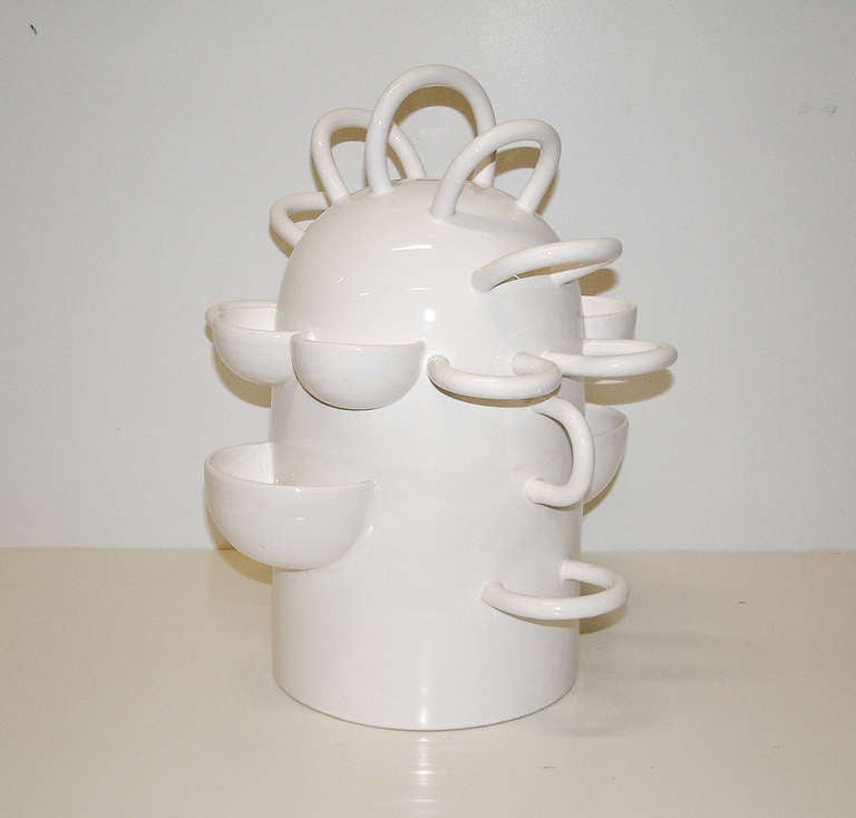A large whimsical white bisque ceramic fruit bowl inspired by the 