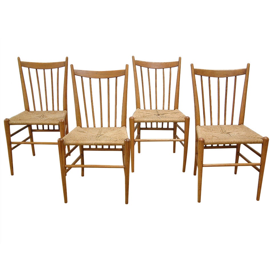 Four Italian Oak Highback Spindle Chairs with Rush Woven Seats, circa