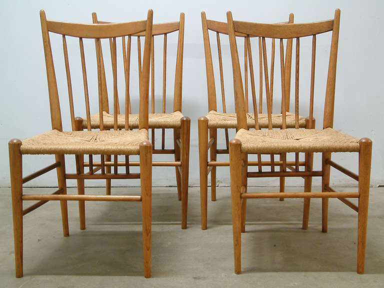 Four Italian Oak Highback Spindle Chairs with Rush Woven Seats, circa 1950