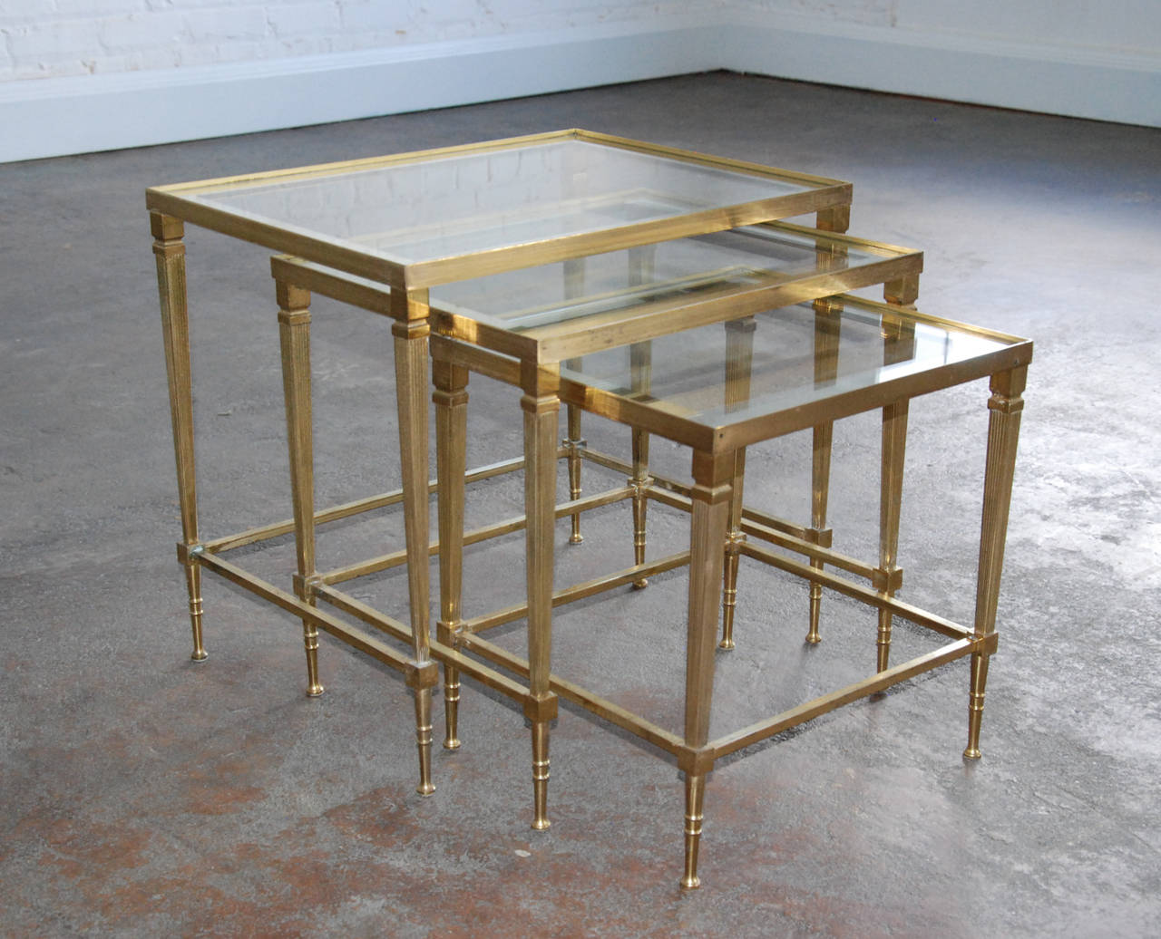 Italian Brass and Mirrored Glass Trio of Nesting Tables, circa 1950