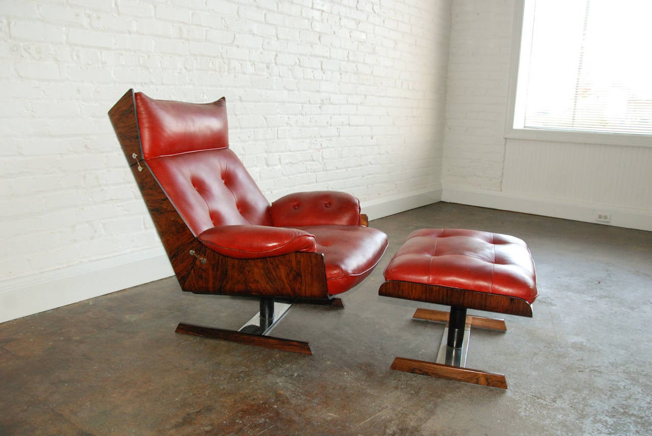 A rare and stunning lounge chair and ottoman by JD Móveis e Decorações Ltda representing Brazilian design at its best.  The design and materials echo the Charles Eames 670 Lounge Chair and 671 Ottoman of the 1950s.  The sumptuous materials of