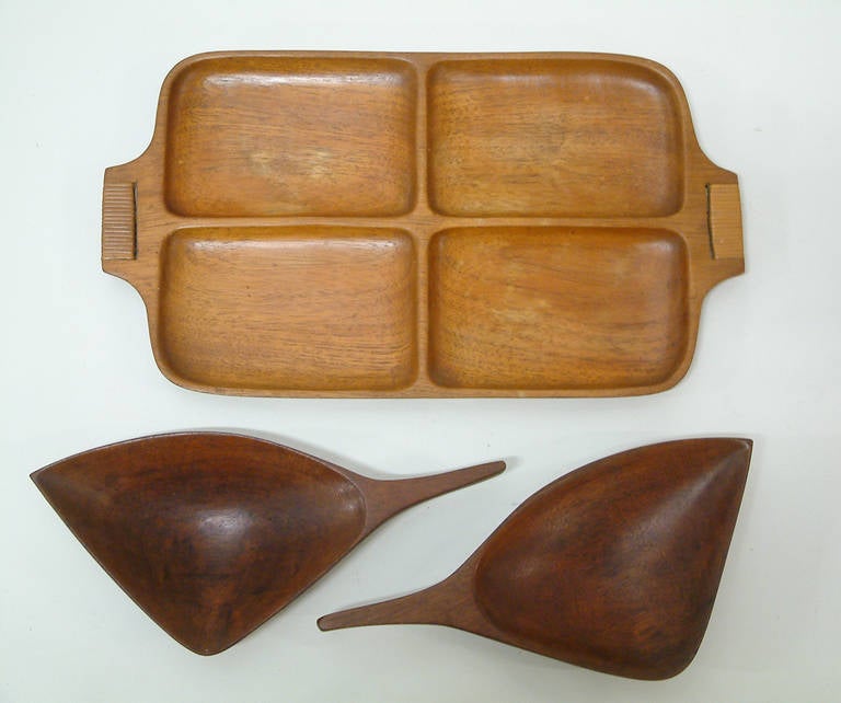 A rare and striking collection of three serving pieces by noted designer Arthur Umanoff for Raymor made in Haiti.  The two bowls are impressed Haiti 2013 and the serving tray has raffia handles.

Measurements:  
Tray 1