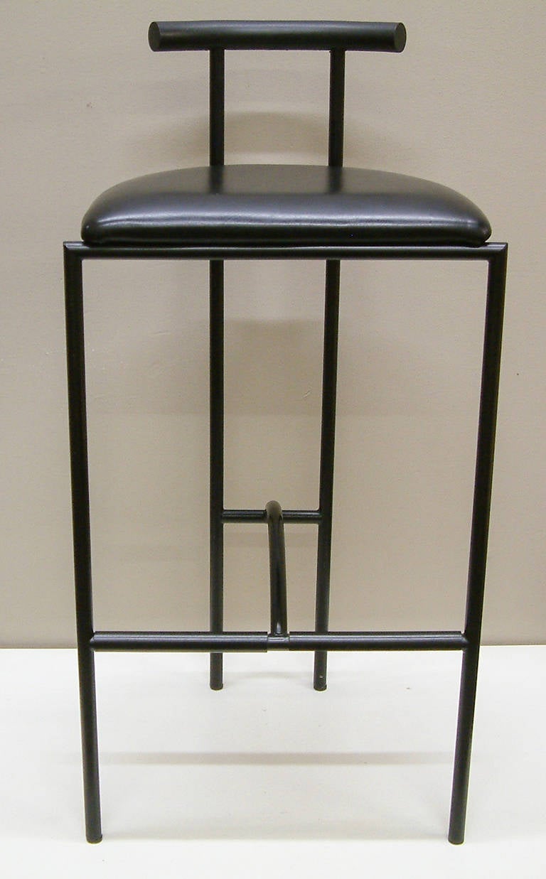 A pair of Minimalist hi-tech polychromed steel, rubber and black leather barstools manufactured by Bieffeplast of DePadova, Italy. The manufacturer's label is applied on the underside.