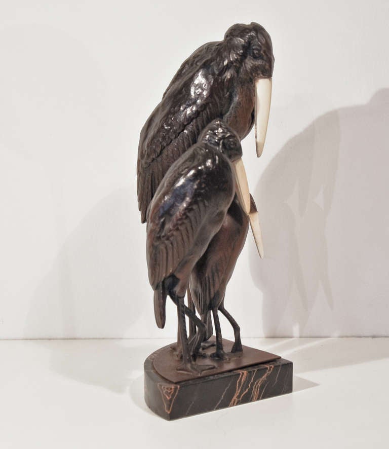 French Trio of Cast Bronze and Bone Art Deco Marabou Storks on a Marble Base