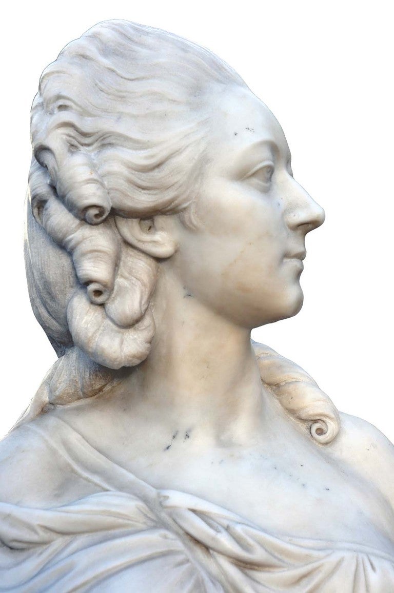 After Augustin Pajou (1730-1809), a white Carrara marble bust of Madame du Barry dated 19th C. The original model kept in Louvre Museum and dated 1773.