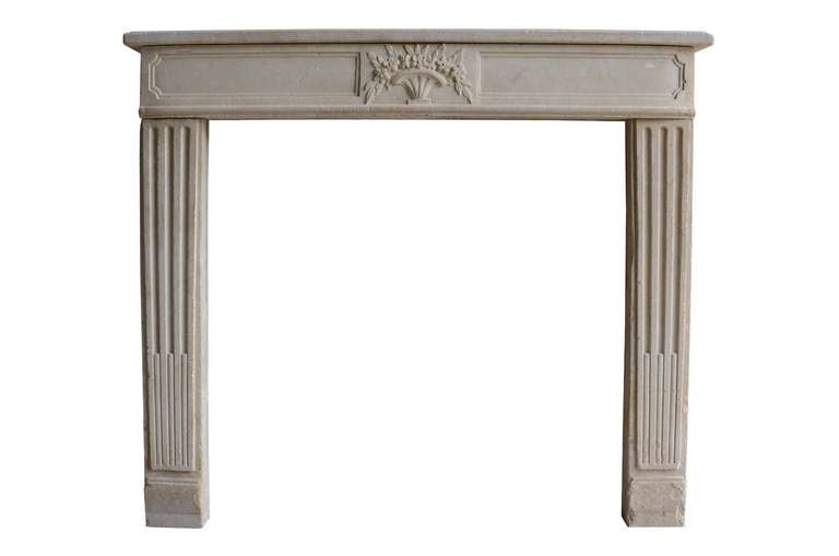 French Louis the 16th period limestone fireplace dated 18th century. Opening : 35 in. H. x 36 in. W. # C3356.