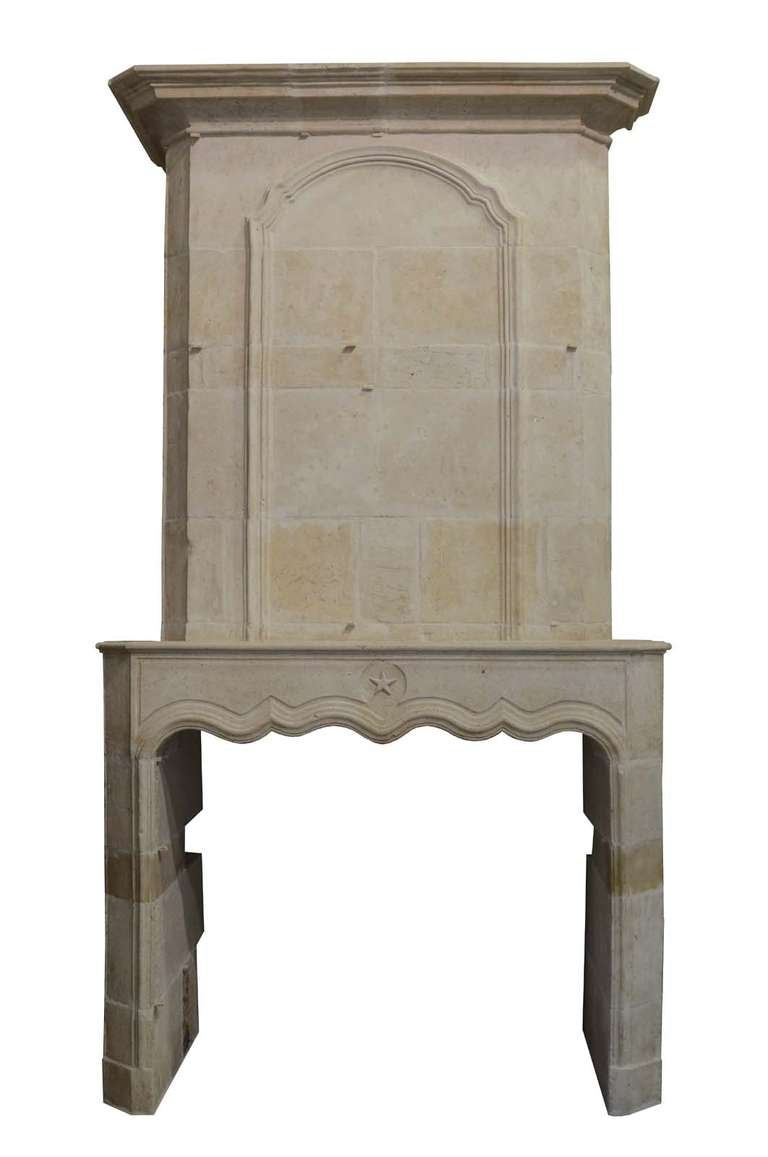 French Louis the 14th period limestone fireplace dated late 17th century or early 18th century. Opening : 43 x 50 in. # C3388