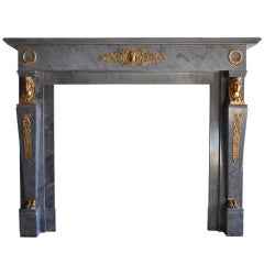 French Empire period marble and gilded bronze fireplace