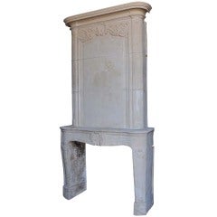 A French Louis the 14th limestone fireplace - 18th century