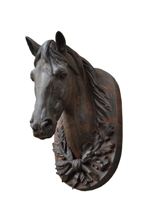 Cast iron horse head dated 19th century. A. DURENNE foundry in SOMMEVOIRE.