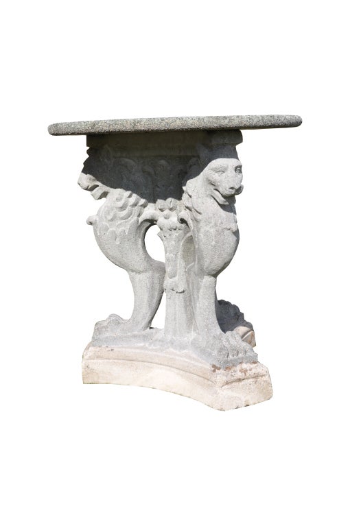 A rare composite stone and marble garden Guéridon dated late 19th century or early 20th century.