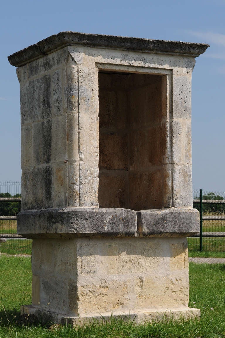 Massive square stone covered wellhead dated 19th century. Origin: Charente. Restored. # E1569
Dimensions:
- Intérior diameter: 27 in.
- Base : 49 x 50 in.
- Stone basement height (under the wellhead): 29 in.