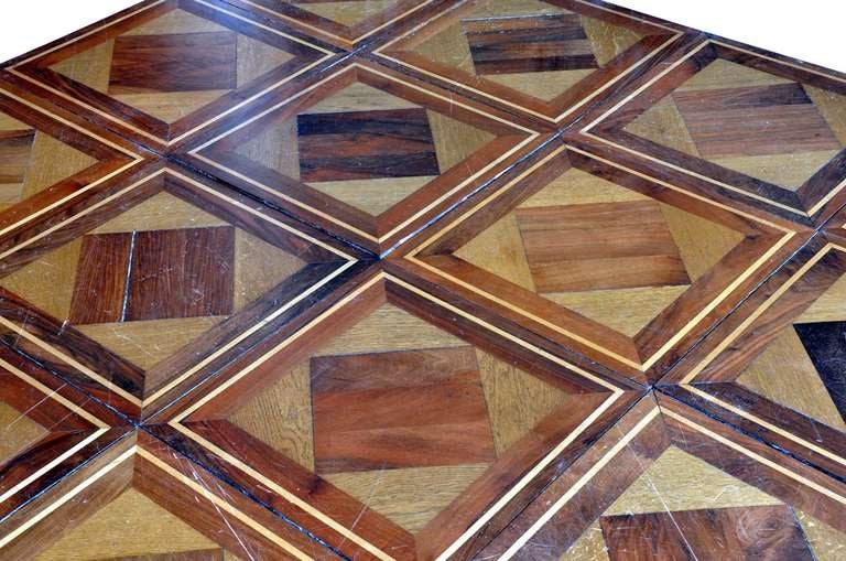 Dated late 19th century, lot of geometrical panels maded in 3 wood species : oakwood, lemon three and merisier. 92 pannels (18,50 sq.m.) and 29 pannels to be restored (+/- 5 sq. m.) #E6197.