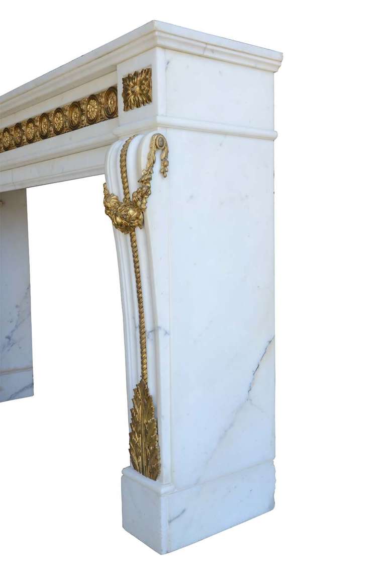 French Louis XVI Style White Marble and Gilded Bronze Fireplace, 19th Century