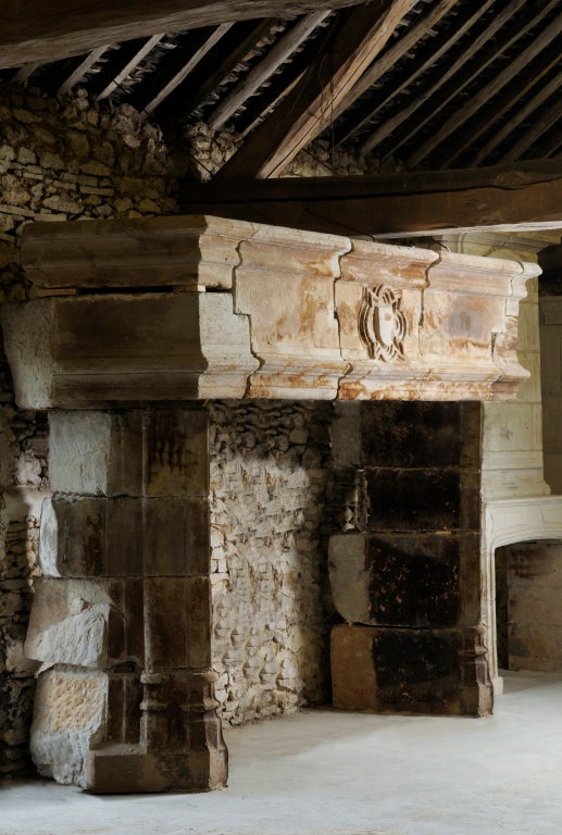 A French gothic period limestone fireplace dated late 15th C.
Origin : Capdenac-le-haut. Opening earth : 69 x 96 in. # C2841