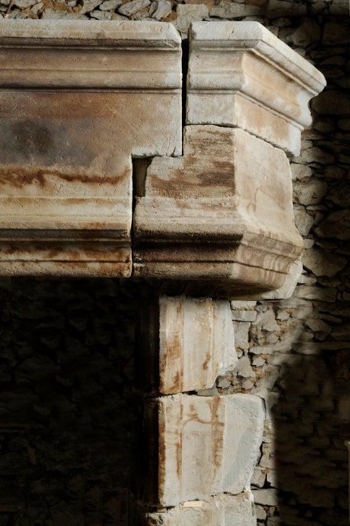 18th Century and Earlier A French gothic period limestone fireplace - 15th century