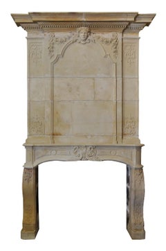 Louis the 14th period richly carved limestone fireplace