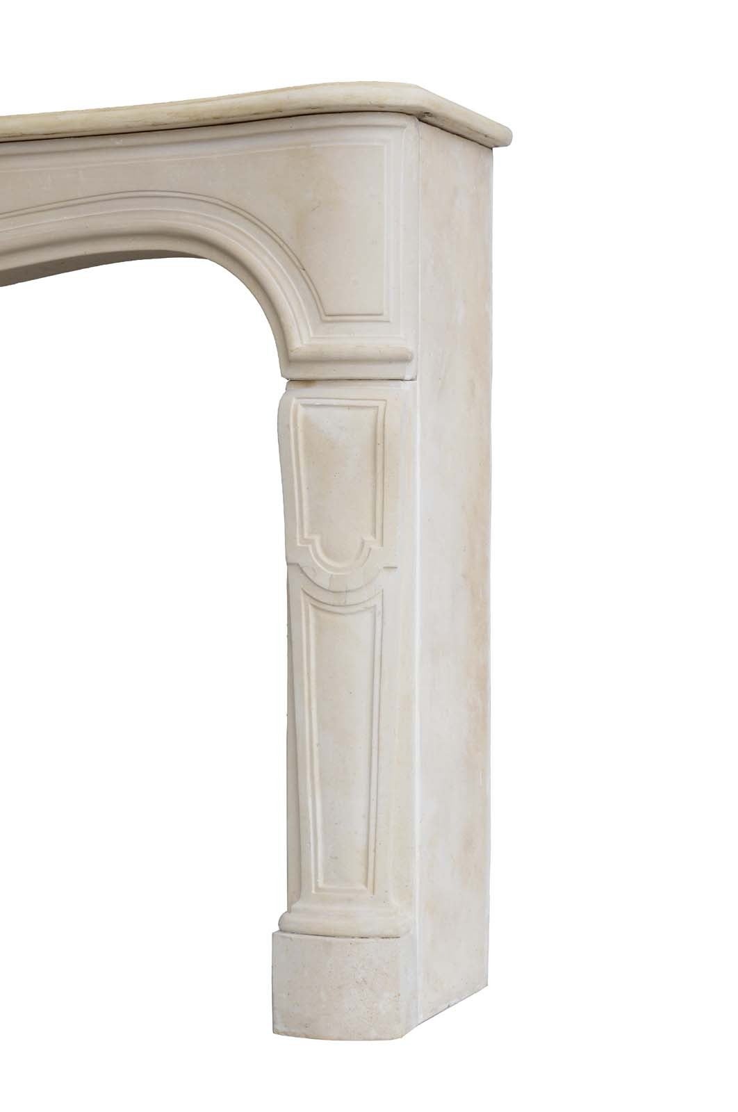 French Louis XV style limestone fireplace dated 19th century. Opening : 37 x 51 in.