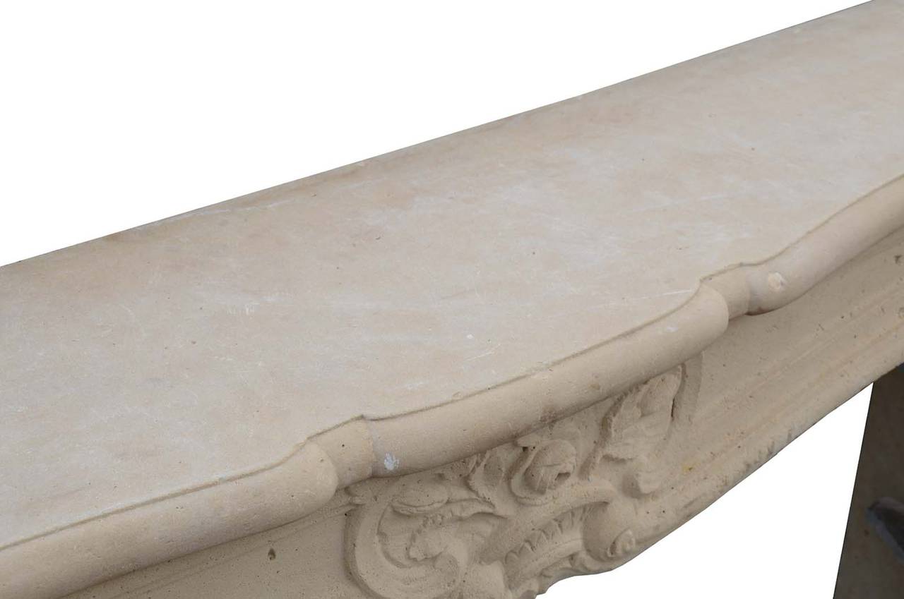 French Louis XV Period Limestone Fireplace, 18th Century 1