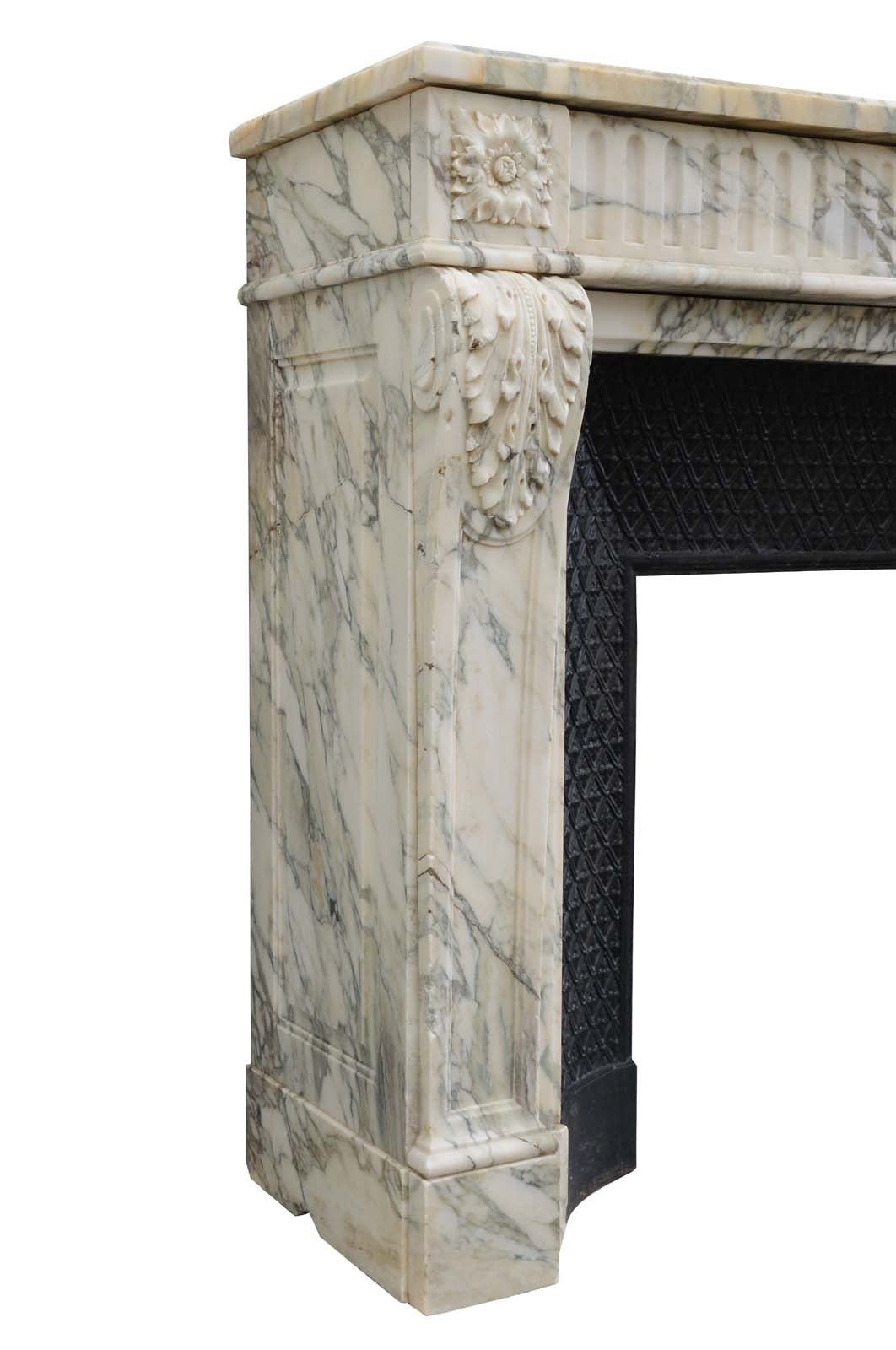 French Louis the 16th style marble fireplace dated 19th century. Marble named marbre Arabescato. Opening at the cast iron fireback: 23 x 25 in. # C3475.