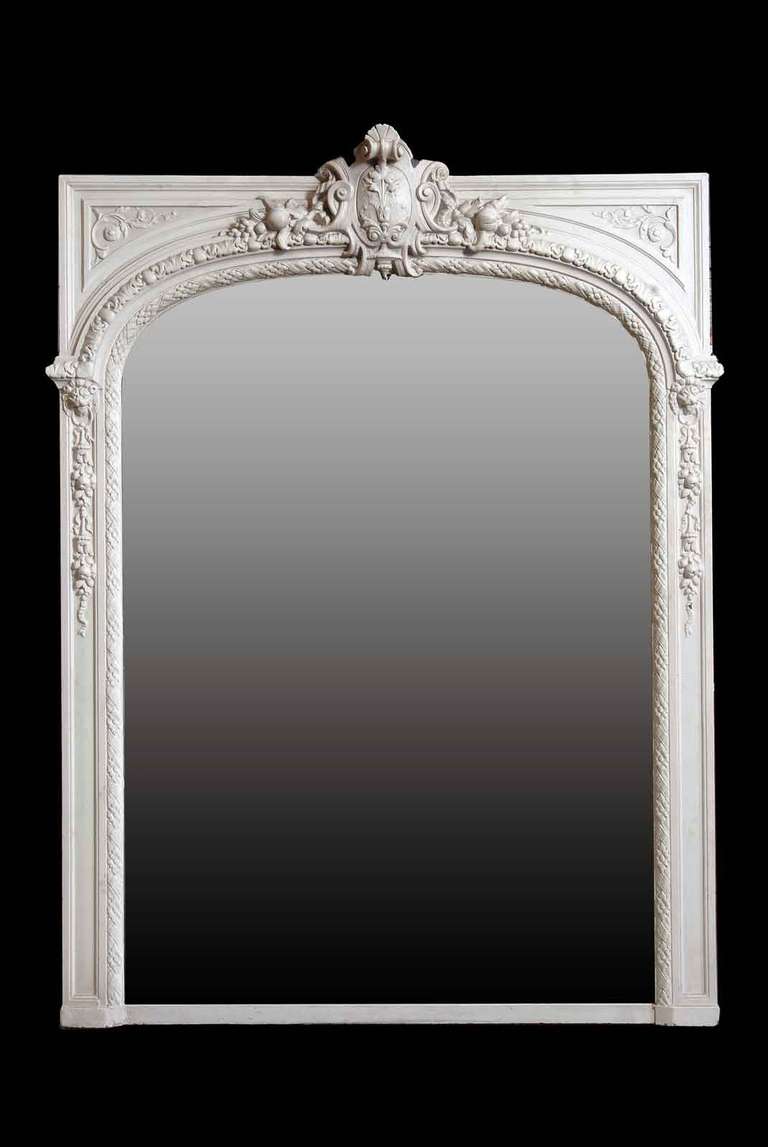 A French Louis the 14th style wood and stucco pier glass. Late 19th Century. Origin : Paris - Avenue de Wagram. # P1084