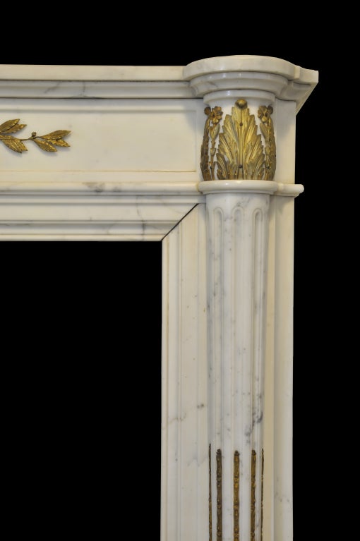 Louis XVI French Louis the 16th style white marble and gilded bronze fireplace - 19th C.
