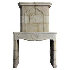 Antique French Louis XIV Period Limestone Fireplace, Early 18th Century