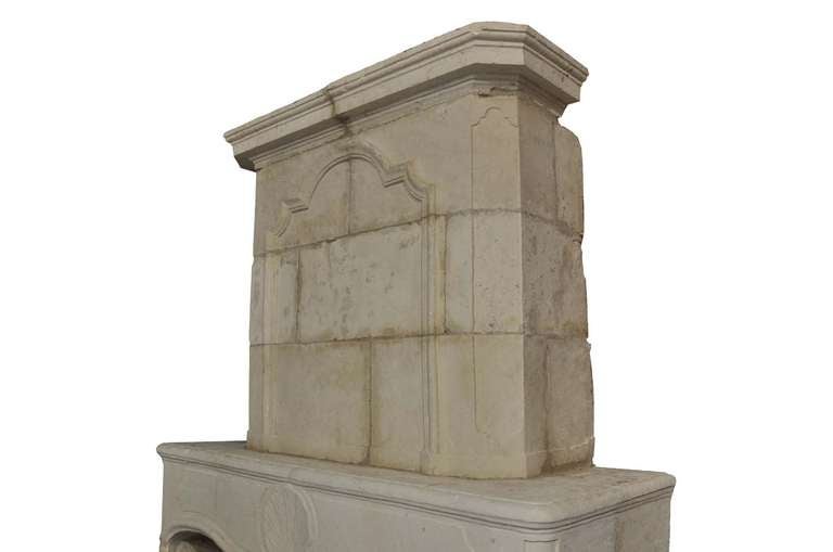 18th Century and Earlier French Louis XIV Period Limestone Fireplace, Early 18th Century For Sale