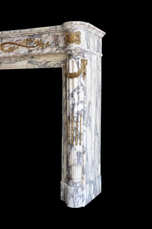 French Louis XVI Style Marble and Gilded Bronze Fireplace