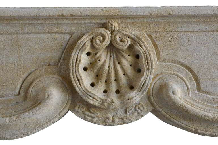 18th Century and Earlier French Louis XV Period Limestone Fireplace, 18th Century For Sale