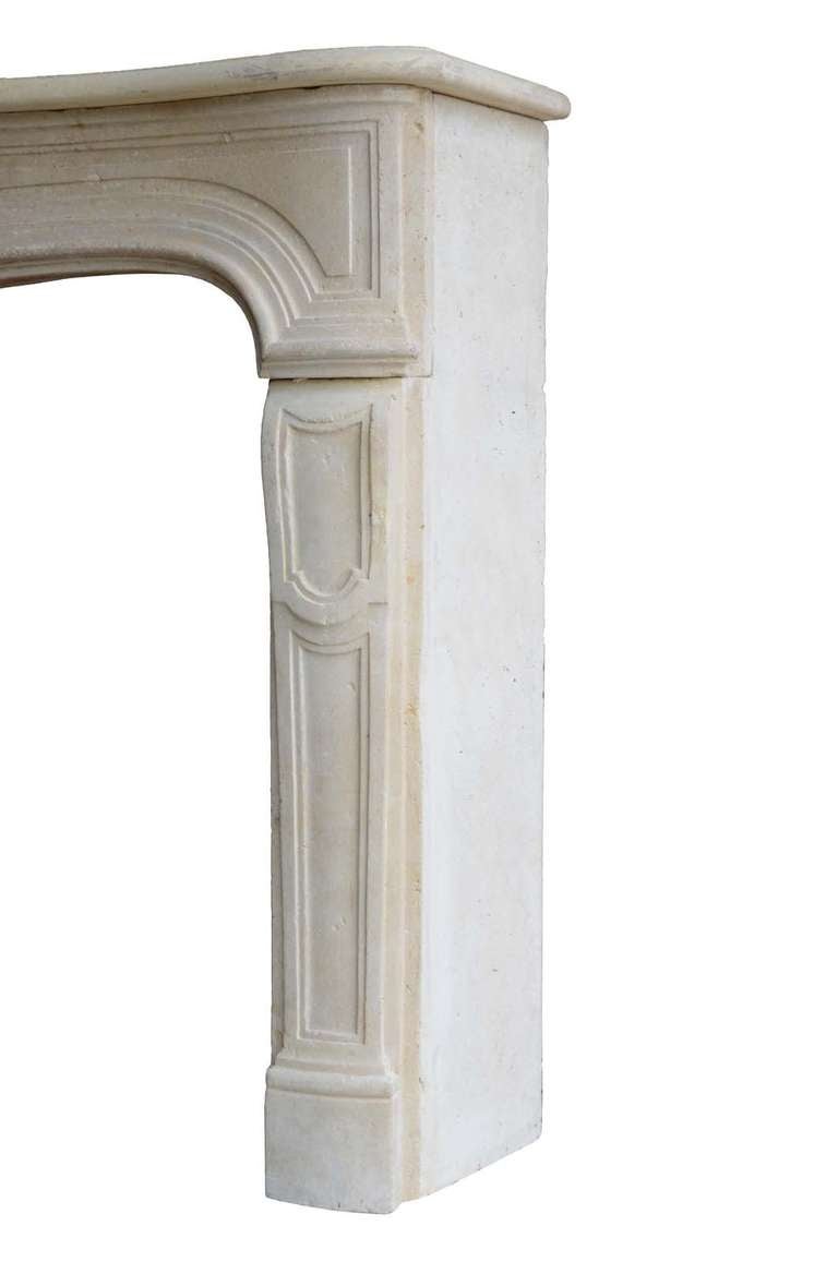 French Louis the 15th period limestone fireplace dated 18th century. Opening : 33 x 40 in. # C3407.