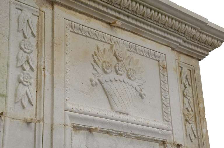 18th Century and Earlier French Directoire period limestone fireplace - Late 18th century.