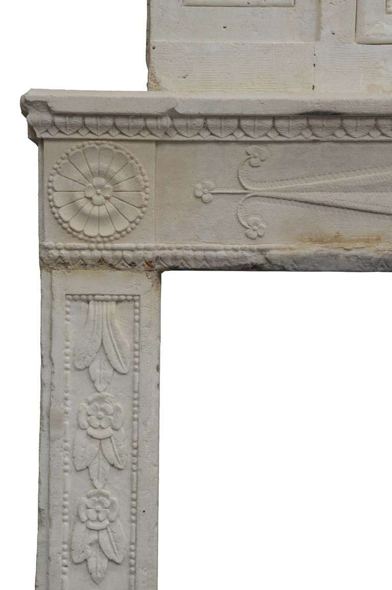 French Directoire period limestone fireplace - Late 18th century. 1