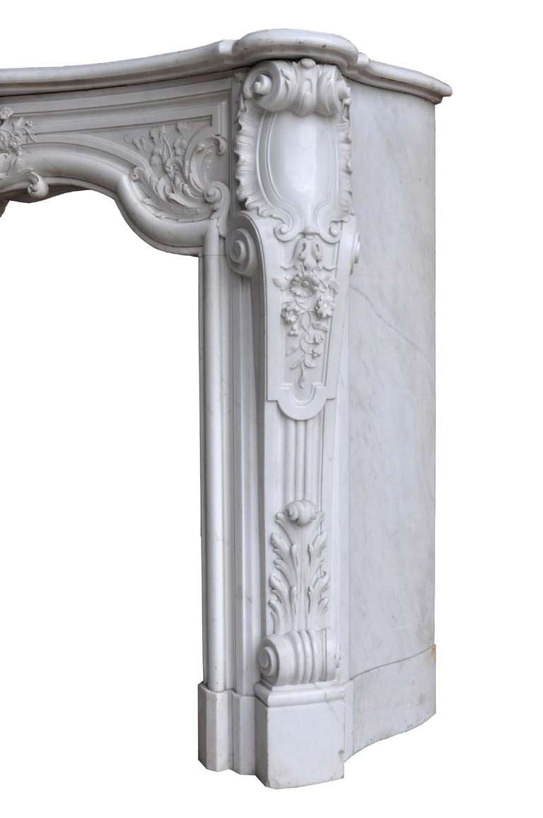 19th Century French Louis XV style white marble fireplace