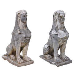 A pair of George III portland stone sphinxes dated late 18th century