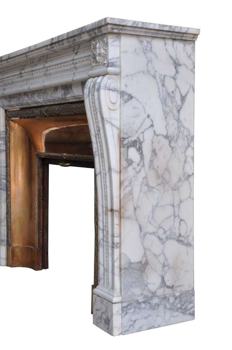 French Louis the 16th style marble and brass firplace dated 19th century. Origin : Paris. Opening : 33 in. H. - 24 in. W. # C3348