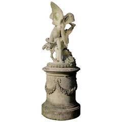 French Louis XVI Style Composite Stone Cupid, 19th Century