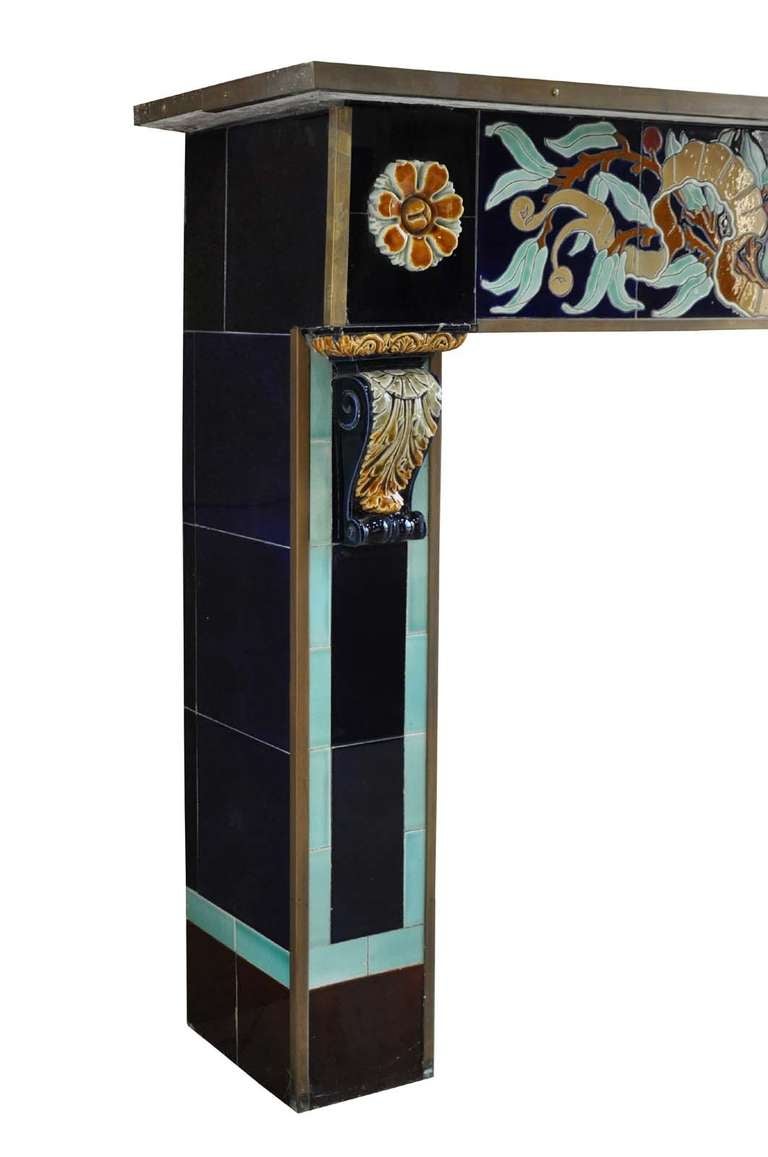 A French Art Nouveau style terracotta fireplace. Ca 1910. Opening : 31 in. H. x 39 in. W. # C3146.