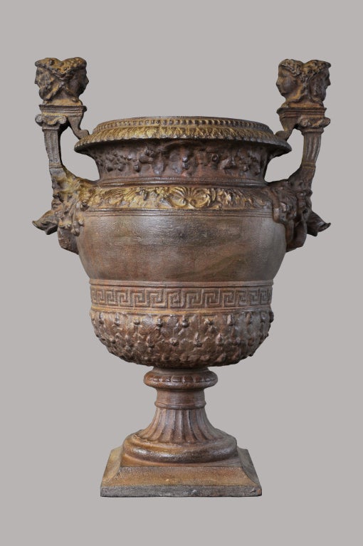 A rare cast iron garden vase dated late 19th century after the bronze model kept in the park of Versailles. The original was designed by Claude Ballin. Duval maded in bronze the set of 9 vases in the 18th century. Paris - Ducel Foundry.