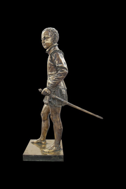 A French 19th century bronze statue of Henri IV child, after Baron François-Joseph Bosio (1768-1845). The silver original statue kept in Louvre Museum. Base: 16 x 14 in. # E5980.