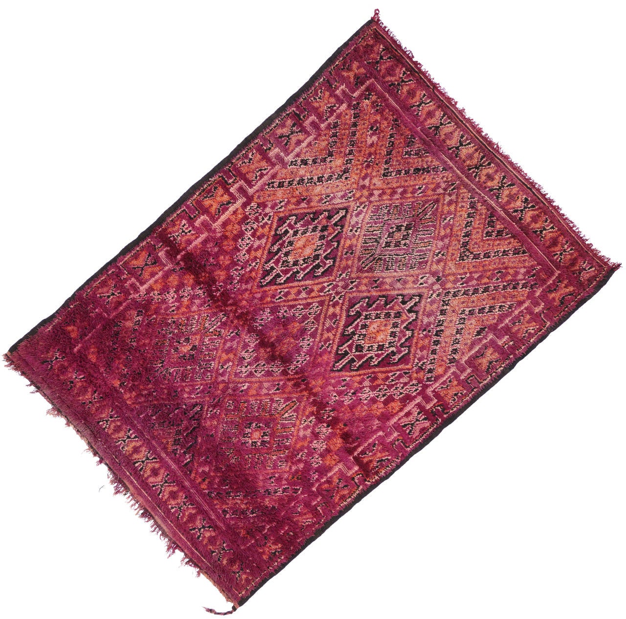 The Berber carpets from Morocco are part of North Africa's renowned indigenous tribe weaving. An extremely lively and colorful vintage Moroccan carpet that can transform a plain room into a lively space. The Moroccan carpet weavers, mostly women,