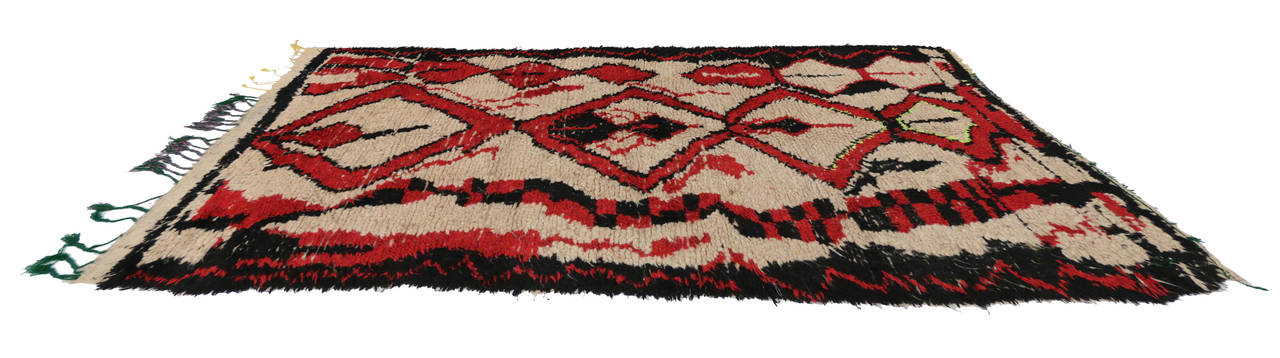 In our endless pursuit of fabulous spaces and inspiring interiors, one is always drawn to the impact of red, black and white abstract art. The look is always Primitive, yet sophisticated. Contemporary and abstract rugs and carpet runners can be a