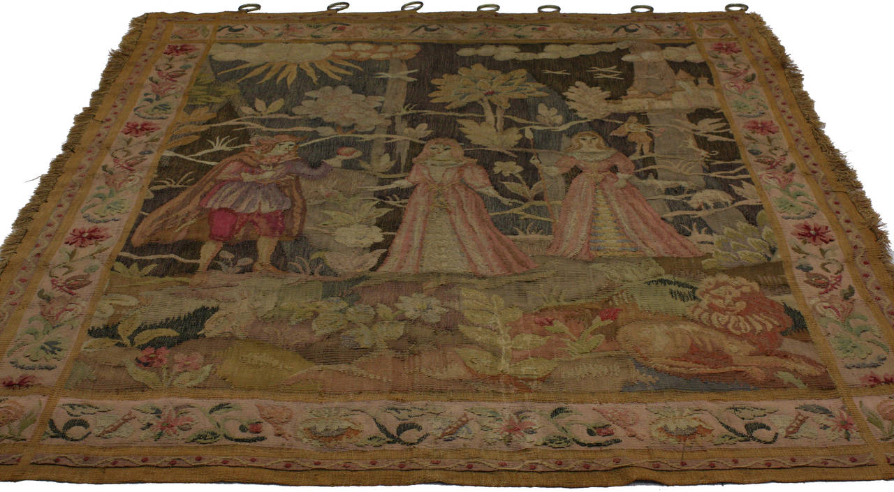 This is a late 19th century French Aubusson tapestry reflecting a wonderful iteration of ‘le rustique’ style for which Aubusson became renowned. The refreshing variegated shades of gold, brown, pink, lavender and green combined with a beautiful