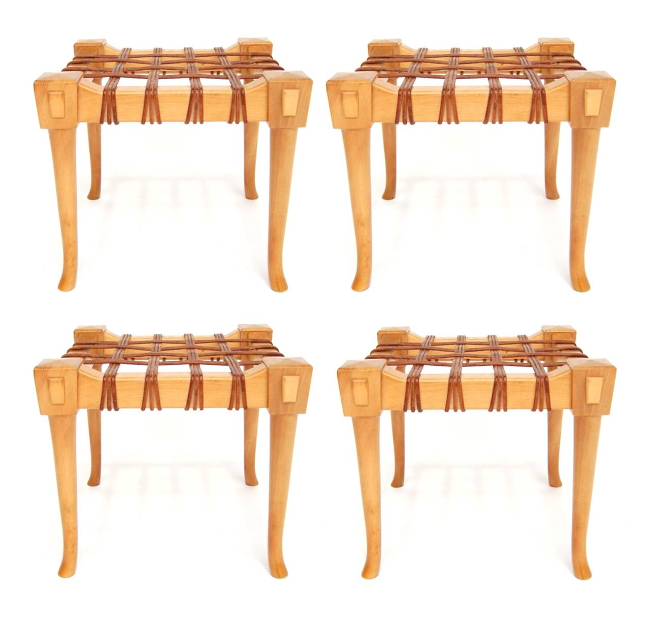 Four Klismos style stools in bleached walnut with leather cord. Stools are stackable.

We offer free delivery on most of our items within the Long Island or greater NYC, Northern New Jersey, Connecticut and Massachusetts areas. Please inquire for