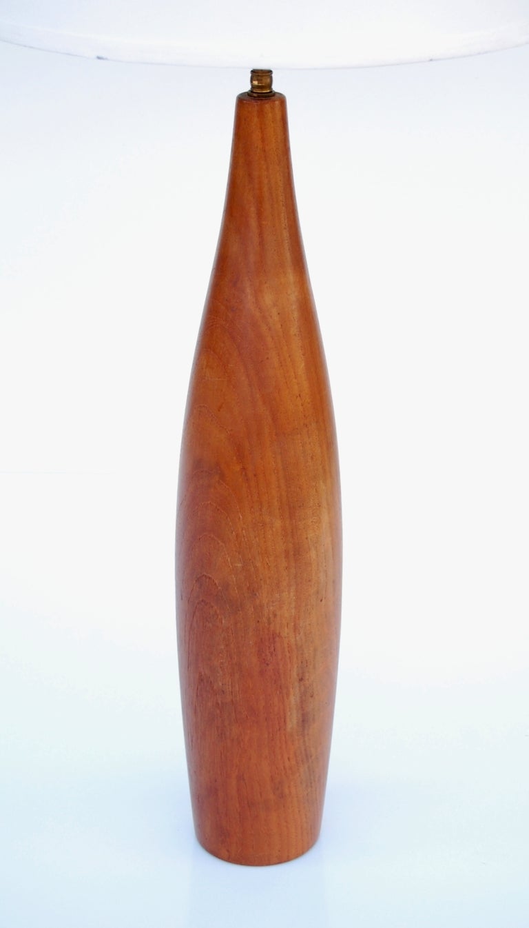 Solid teak table lamp by ESA, Denmark 1950's - 1960's with a very pleasing tapered form body. Wonderful patina.

We offer free delivery within the Long Island / Greater NYC,
northern New Jersey, Connecticut and Massachusetts areas on most of our