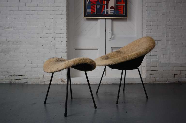 Sheep Skin covered chair and ottoman.