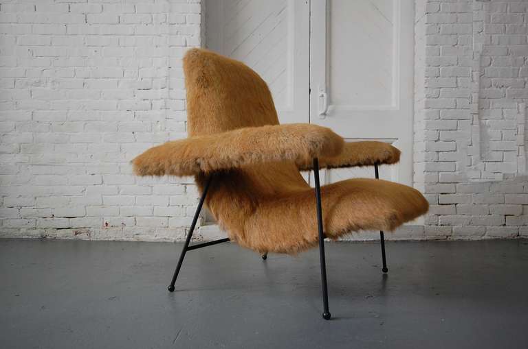 Rare Dan Johnson lounge chair, circa 1958. Upholstered in synthetic fur. Wrought iron frame with ball feel. Fully restored. New Upholstery.

We offer free delivery on most of our items within the Long Island / Greater NYC, northern New Jersey,